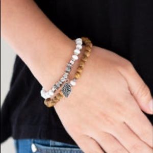White & brown beaded bracelet with leaf